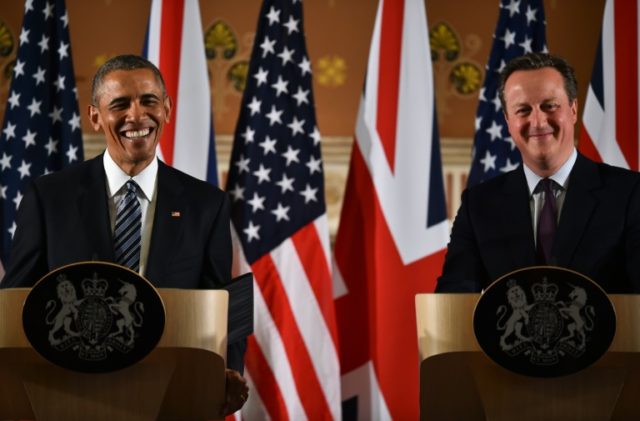 US President Barack Obama (L) smiles during a press conference with Britain's Prime Minist