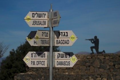 A sign shows the distance to Damascus and Baghdad at an army post on Mount Bental in the Israeli-annexed Golan Heights