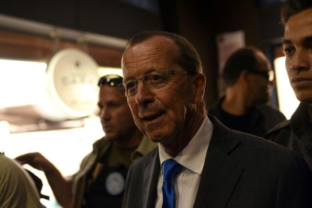 The UN envoy for Libya, Martin Kobler (C) meets Libyans during a tour in the Tripoli's old