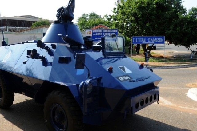 A police armoured car patrols in Accra on December 9, 2012
