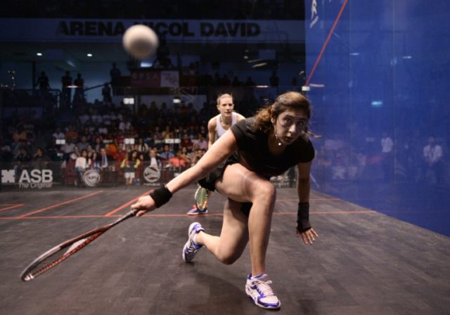 Nour El Sherbini of Egypt plays a forehand against Laura Massaro of England during the fin