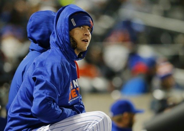 Jacob deGrom of the New York Mets watches the action against the Philadelphia Phillies fro