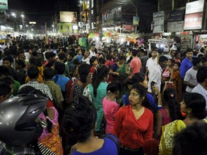 People crowd onto the street during an earthquake in Agartala, capital of India's northeastern state of Tripura, on April 13, 2016