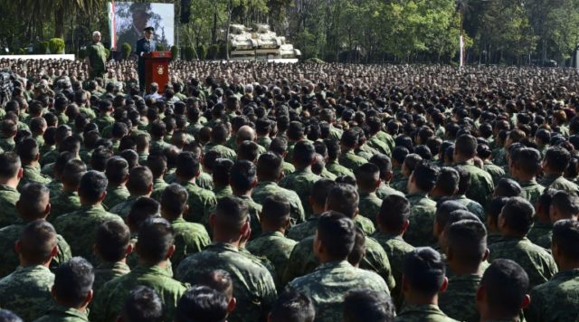 Mexican Defense Secretary Salvador Cienfuegos reads out a public apology over a torture sc