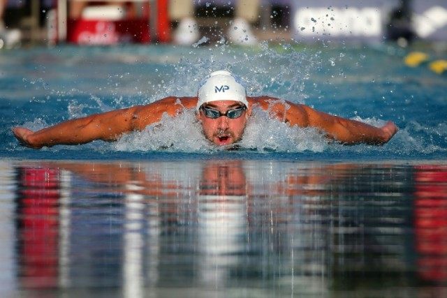 Michael Phelps competes in the finals of the men's 200m individual medley at the Mesa Pro