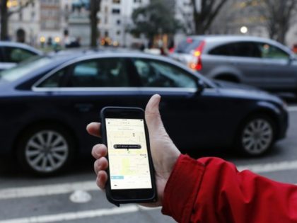 Uber agreed to pay up to $100 million to settle lawsuits from drivers in California and Ma