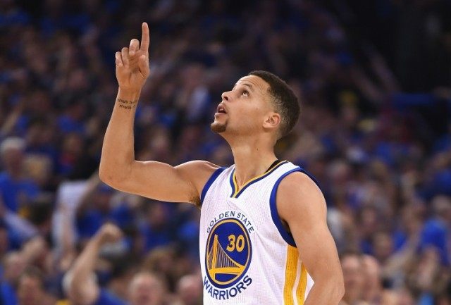 Stephen Curry of the Golden State Warriors gestures in the first half against the Memphis