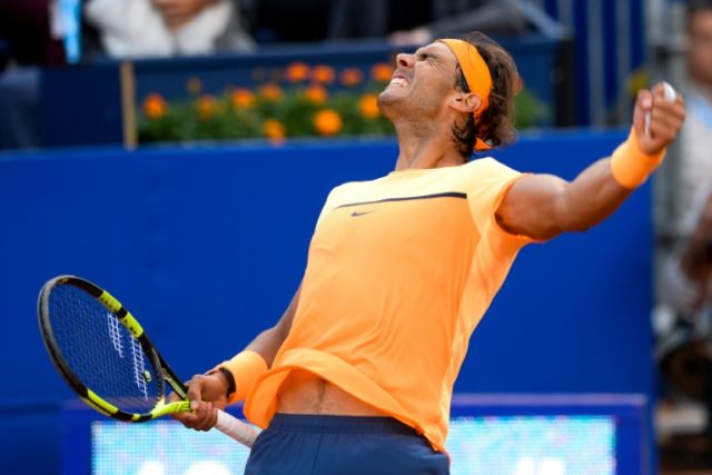 Spanish tennis player Rafael Nadal celebrates after winning against German tennis player P