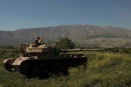The wreckage of a tank in the Israeli-occupied sector of the Golan Heights, along the bord