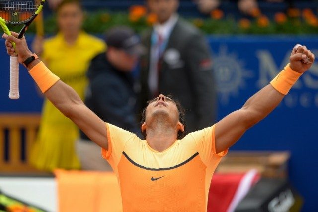 Spain's player Rafael Nadal celebrates after winning against Italian player Fabio Fognini