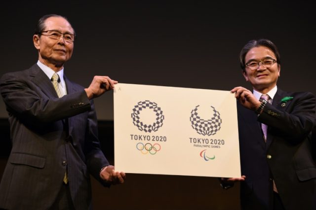 Ryohei Miyata, Tokyo 2020 emblems selection committee chairperson (R), and committee membe