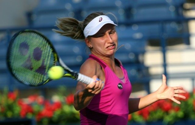 Daria Gavrilova of Australia hits a return during a WTA Dubai Open tournament match, on Fe