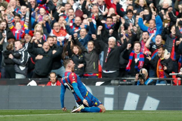 Crystal Palace's English striker Connor Wickham celebrates scoring their second goal durin