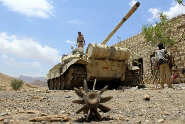Yemeni pro-government forces hold a position east of the Yemeni capital