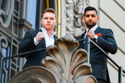 Canelo Alvarez (L) and Amir Khan (R) pose for photos during a press event on March 1, 2016 in New York