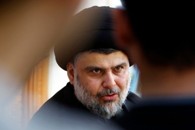 Iraqi Shiite Muslim cleric Moqtada al-Sadr speaks during a press conference in the holy Sh