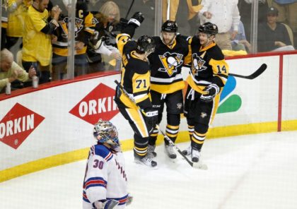 Bryan Rust #17 of the Pittsburgh Penguins celebrates after scoring his second goal in Game Five of the Eastern Conference First Round against the New York Rangers during the 2016 NHL Stanley Cup Playoffs at Consol Energy Center on April 23, 2016