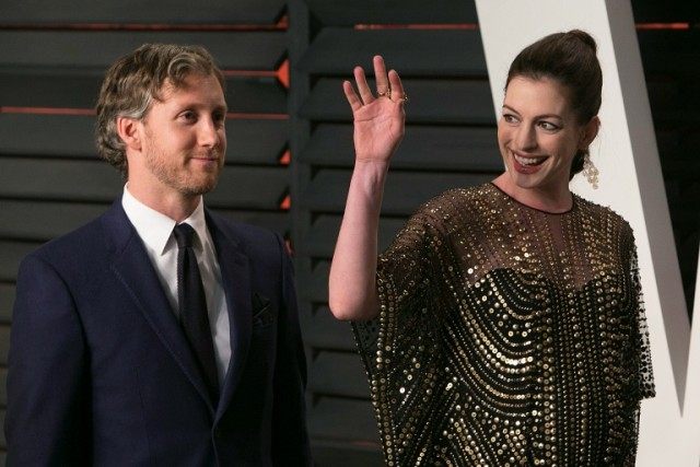 US actress Anne Hathaway, pictured with husband Adam Shulman, has become a first-time moth