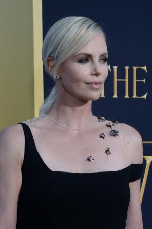 Charlize Theron says her 4-year-old son is 'in love' with her co-star Emily Blunt