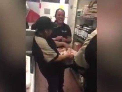 WATCH: Wingstop Restaurant Employee Caught Shoving Face in Raw Chicken