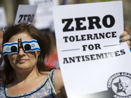 Jewish groups protest outside the Royal Courts of Justice in London on August 31, 2014, as they call for 'Zero Tolerance for Anti-Semitism'