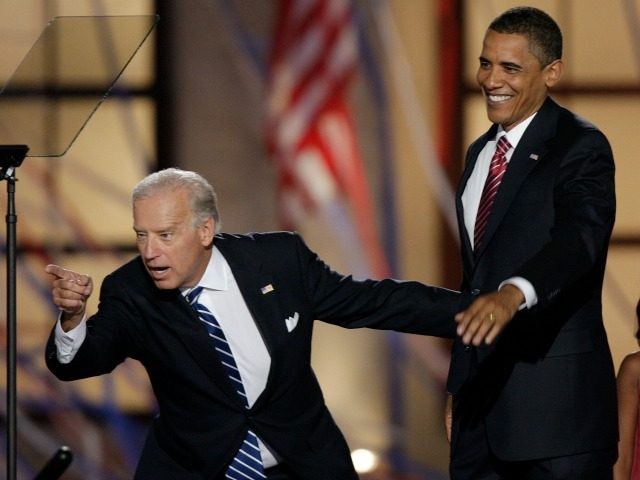 Democratic vice presidential nominee Sen. Joe Biden, D-Del.,points into the crowd as his running mate, Democratic presidential nominee, Sen. Barack Obama, D-Ill., waves after Obama's acceptance speech at the Democratic National Convention in Denver, Thursday, Aug. 28, 2008. (AP Photo/Ron Edmonds)