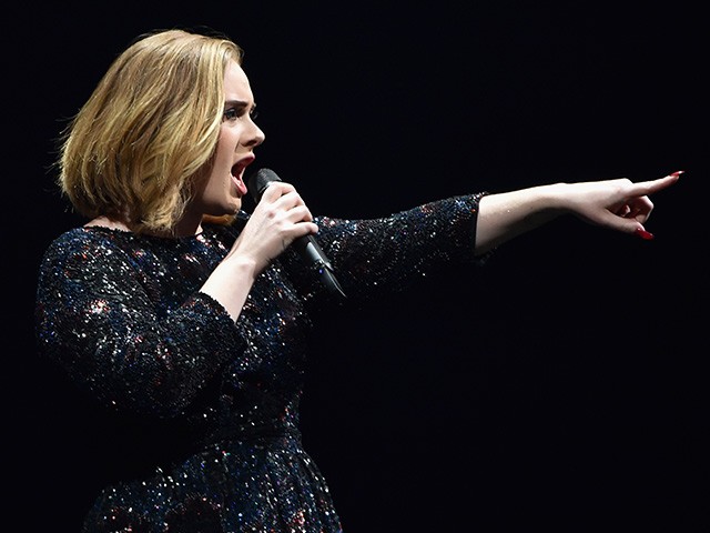 WATCH: Adele Stops Concert To Scold Fan For Filming Her Performance