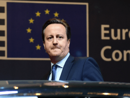 British Prime Minister David Cameron leaves at the end of the first day of an European Cou