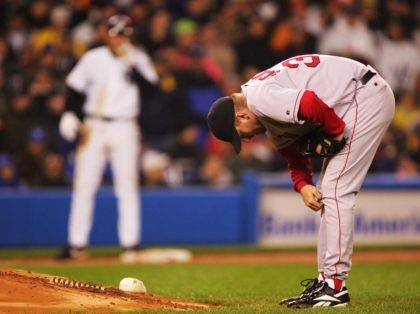 NEW YORK - OCTOBER 19: Pitcher Curt Schilling #38 of the Boston Red Sox takes a look at h