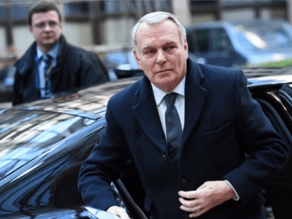 French Foreign Minister Jean-Marc Ayrault arrives to attend an EU foreign affairs council