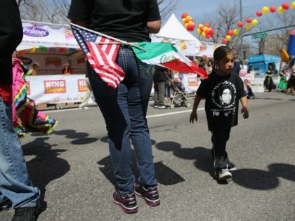 Mexican and American flags are proudly worn at a Cinco de Mayo festival on May 4, 2013 in