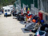 Refugees mainly from Syria, Iran and Iraq are seen inside a registration camp on March 12, 2016 in Moria, Greece.