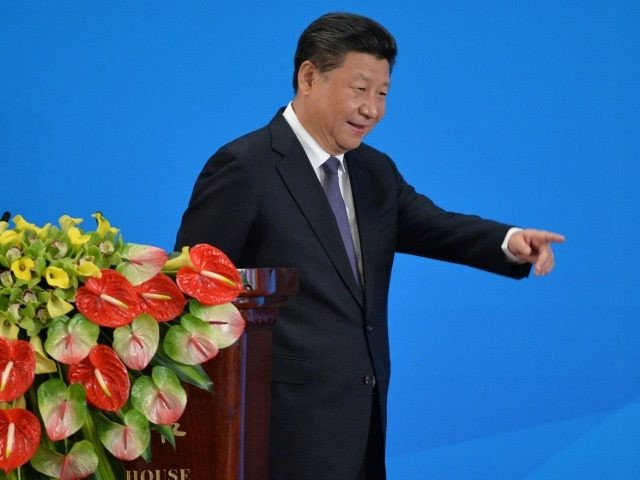 Chinese President, Xi Jinping leaves the stage after the speech on the opening ceremony of