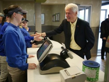 Former President Bill Clinton greets workers on April 30, 2016 in Kokomo, Indiana.