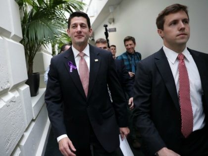 Speaker of the House Rep. Paul Ryan (R-WI) (C) leaves after a news briefing May 11, 2016 o