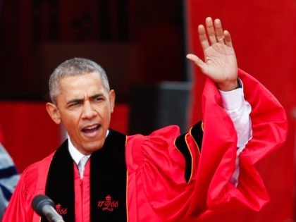 U.S. President Barack Obama waves to the crowd during the 250th anniversary commencement ceremony at Rutgers University on May 15, 2016 in New Brunswick, New Jersey.