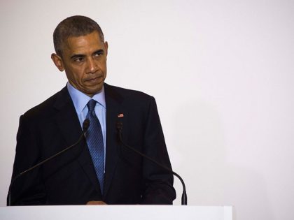 US President Barack Obama listens as Japanese Prime Minister Shinzo Abe speaks at a bilate