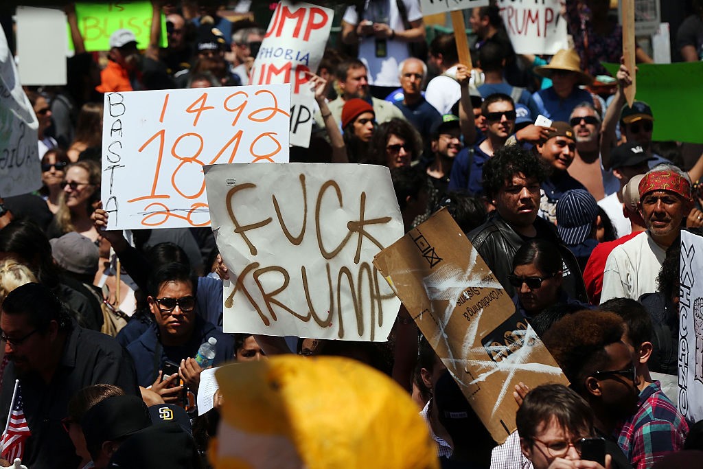 SAN DIEGO, CA - MAY 27: Demonstrators protest outside of an arena where the presumptive Republican presidential candidate Donald Trump is holding a rally in San Diego on May 27, 2016 in Fresno, California. Trump is on a western campaign trip which saw stops in North Dakota and Montana yesterday and two more in California today. (Photo by Spencer Platt/Getty Images)