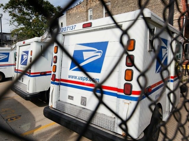 United States Postal Service trucks August 25, 2009 in Chicago, Illinois.