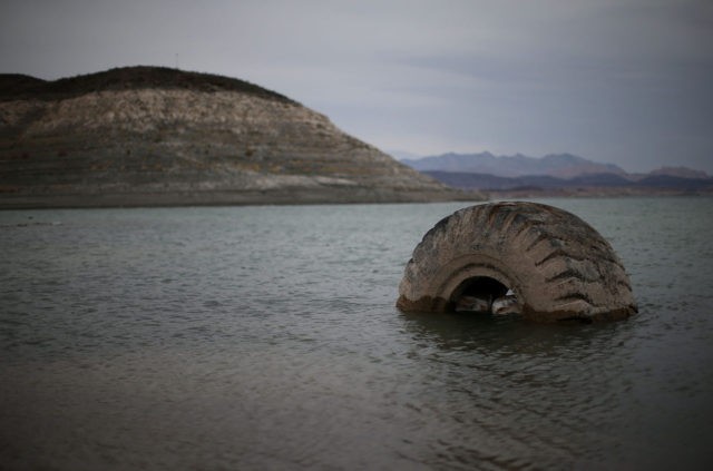 LAKE MEAD NRA, NV - MAY 13: A tractor tire sits in the waters of Lake Mead near Boulder B