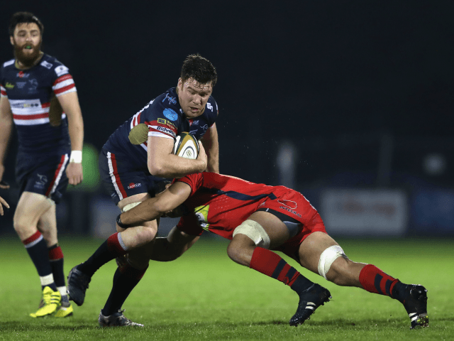 DONCASTER, ENGLAND - MAY 18: Ollie Steadman of Doncaster Knights is tackled during the Greene King IPA Championship Play Off Final match First Leg between Doncaster Knights and Bristol Rugby at Castle Park rugby stadium on May 18, 2016 in Doncaster, England.