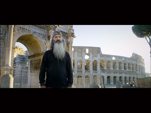 Phil Robertson filming in Rome before the Coliseum for the documentary "Torchbearer&q