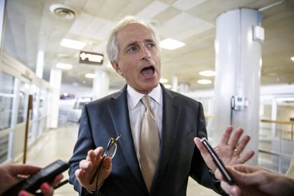 Sen. Bob Corker, R-Tenn., the ranking member of the Senate Foreign Relations Committee, speaks to reporters in the Senate subway at the Capitol in Washington, Thursday, July 31, 2014. As the U.S. Congress staggered toward a five-week summer break Thursday, it appeared legislation to send Israel millions of dollars for …