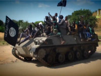 boko-haram-tank-islamic-state-afp NIGERIA, Kano : A screengrab taken on November 9, 2014 from a new Boko Haram video released by the Nigerian Islamist extremist group Boko Haram and obtained by AFP shows Boko Haram fighters parading on a tank in an unidentified town. The leader of the Nigerian Islamist extremist group Boko …