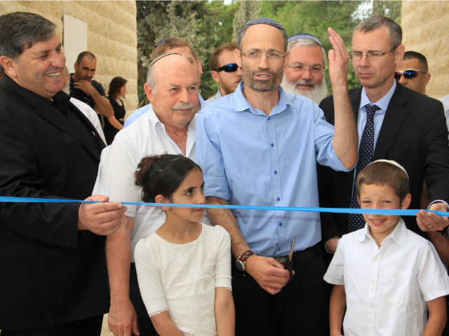 Israeli Knesset Members attend the ribbon-cutting ceremony for the new visitors center in