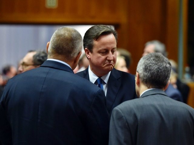 British Prime Minister David Cameron (2nd L) speaks with Bulgarian president Rosen Plevnel