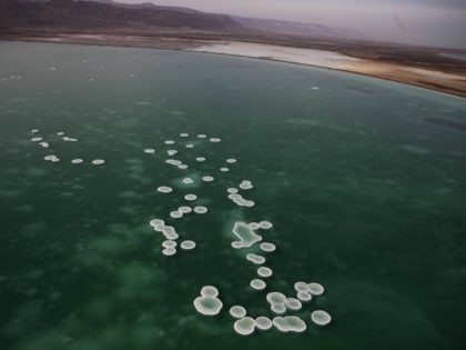 An aerial view photo shows large salt formations in the southern part of the Dead Sea, nea