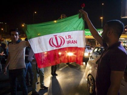 Iranians celebrate on the streets following a nuclear deal with major powers, in Tehran Ju