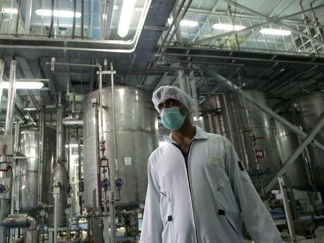 An Iranian technician works at the Isfahan Uranium Conversion Facilities (UCF), 420 kms south of Tehran, 03 February 2007. Iran opened the doors to its uranium conversion plant today in a bid to show its good intentions amid mounting international pressure for a halt its controversial nuclear programme. A delegation …