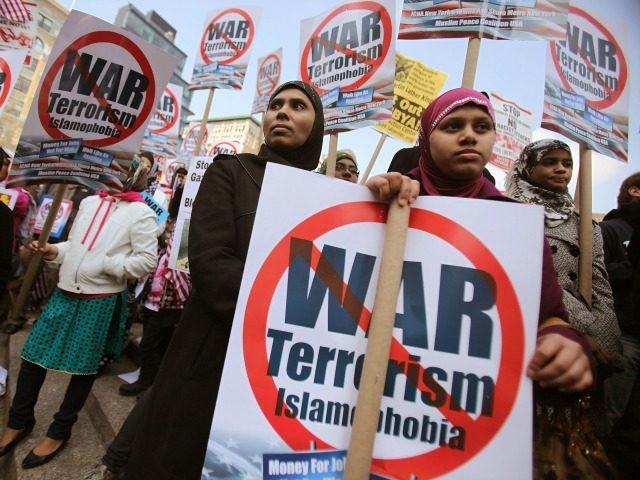 Muslim protesters gather at a large anti-war rally in Union Square on April 9, 2011 in New